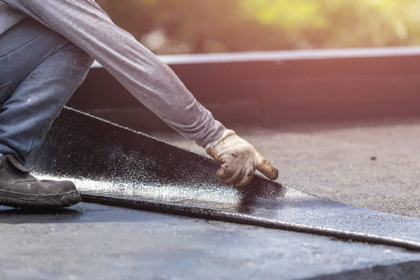 Professional Basement Waterproofing technician working in Calera, AL